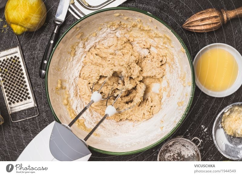 Mix dough with hand mixer Food Cake Nutrition Crockery Bowl Style Design Table Kitchen Gateau Dough Baking Kitchen Table Cookie Cooking Colour photo Studio shot