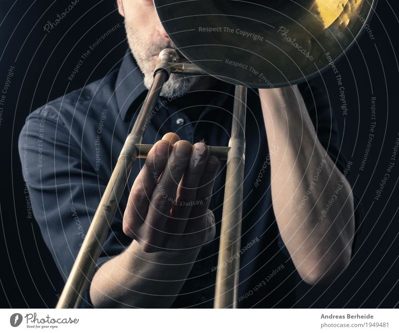 play the trombone Style Music Human being Man Adults 1 30 - 45 years Shows Playing Concentrate Creativity Art Jazz tool Musical Background picture Blues