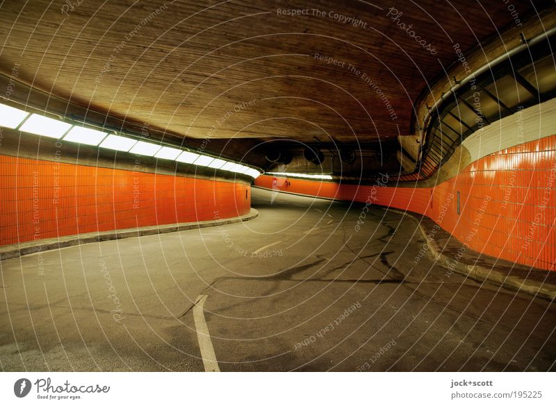 free passage for underworlders in the tunnel Tunnel Street Concrete Illuminate Large Long Retro Gloomy Orange Curve Median strip Tile Seventies Tunnel vision