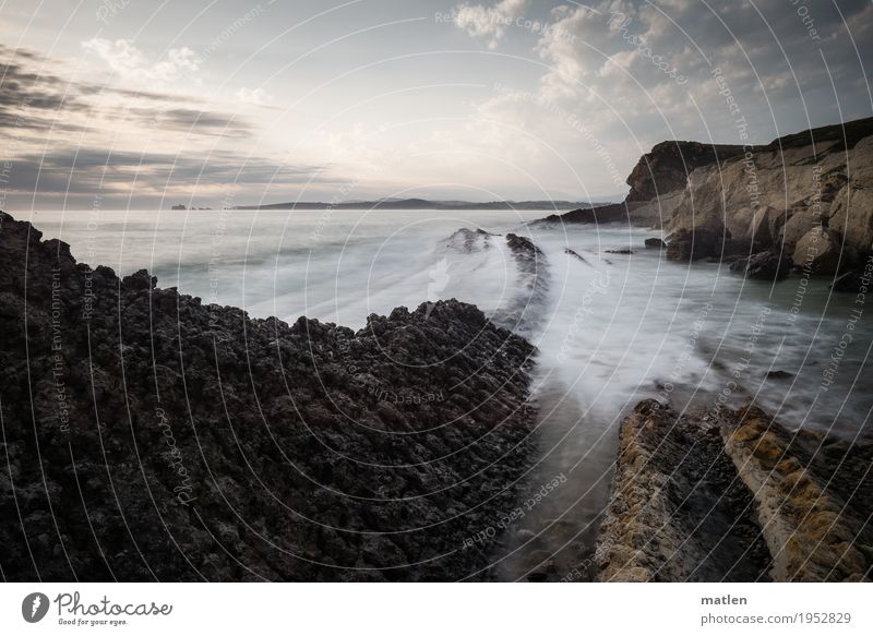 sea route Nature Landscape Water Sky Clouds Horizon Weather Beautiful weather Rock Waves Coast Beach Reef Ocean Deserted Sharp-edged Fantastic Gigantic Blue