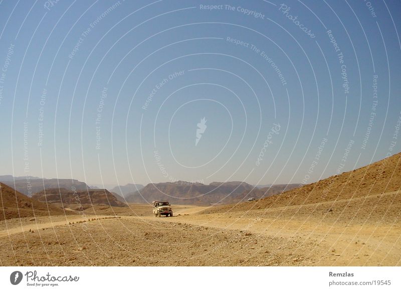 Jeep in the desert of Sinai (1) Offroad vehicle Contentment jeep Desert Stone Sky Sand Far-off places Freedom