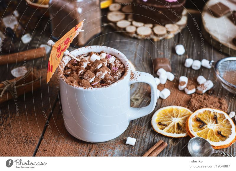 3 year old boy drinking mug of hot chocolate in a cafe Stock Photo - Alamy