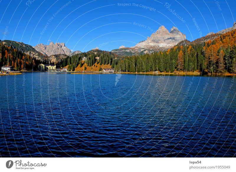 Lake Misurina in the Dolomites with Three Peaks, South Tyrol, Italy Environment Nature Landscape Water Sky Cloudless sky Sunlight Autumn Beautiful weather