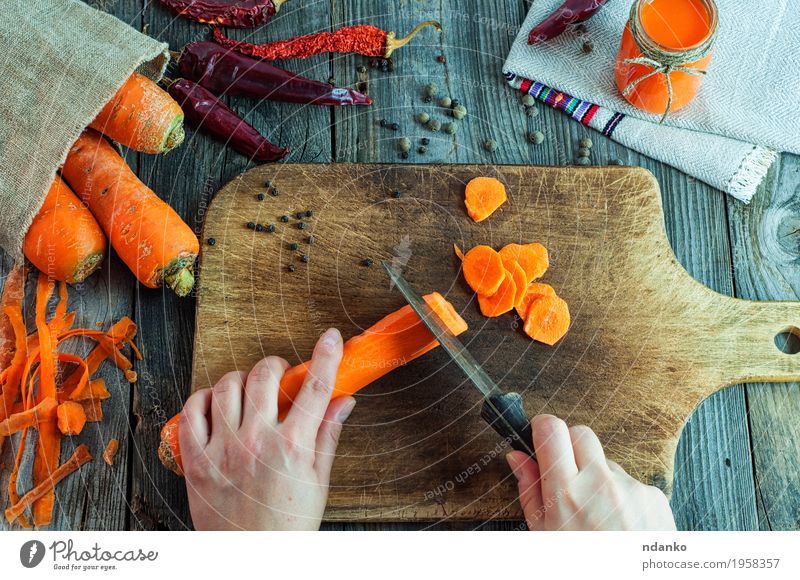 process of cutting slices of fresh carrots Food Vegetable Herbs and spices Nutrition Vegetarian diet Diet Beverage Juice Bottle Healthy Eating Table Woman