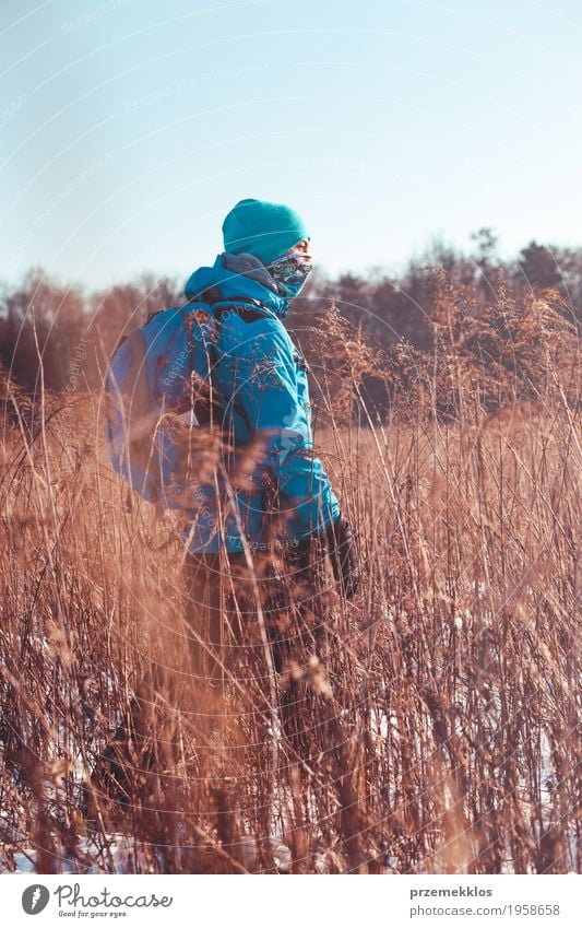 Boy hiking through meadows in the wintertime Lifestyle Joy Vacation & Travel Trip Adventure Freedom Expedition Winter Snow Winter vacation Hiking Boy (child) 1