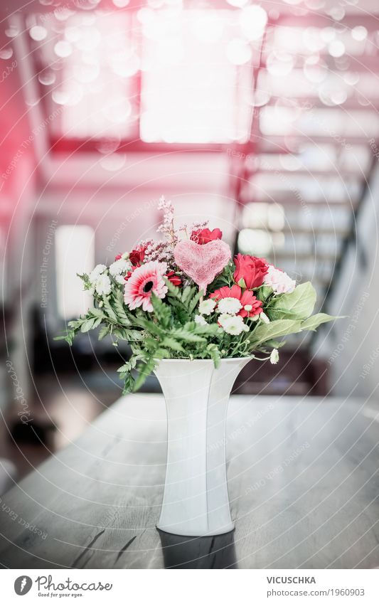 Flowers With Heart In Vase On Table In Living Room A Royalty Free Stock Photo From Photocase