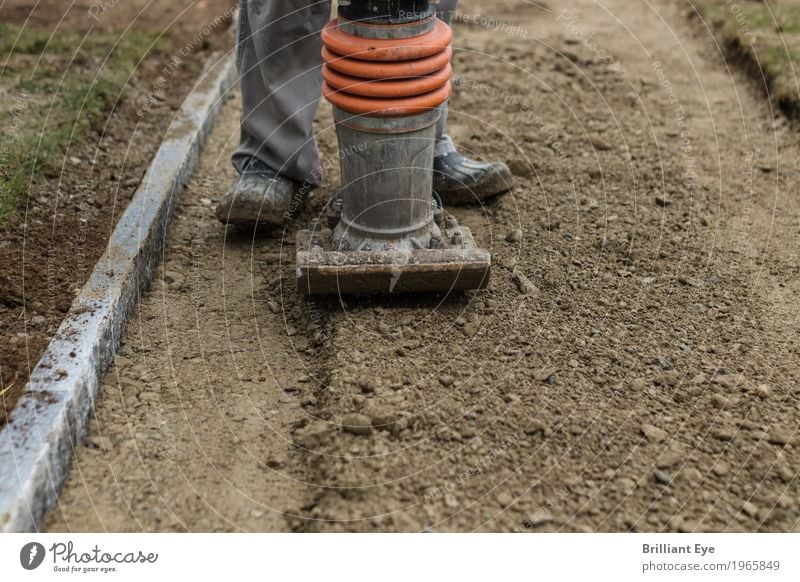 flatten Garden Profession Craftsperson Construction site Craft (trade) Construction machinery Human being Legs 1 Nature Earth Work and employment Walking