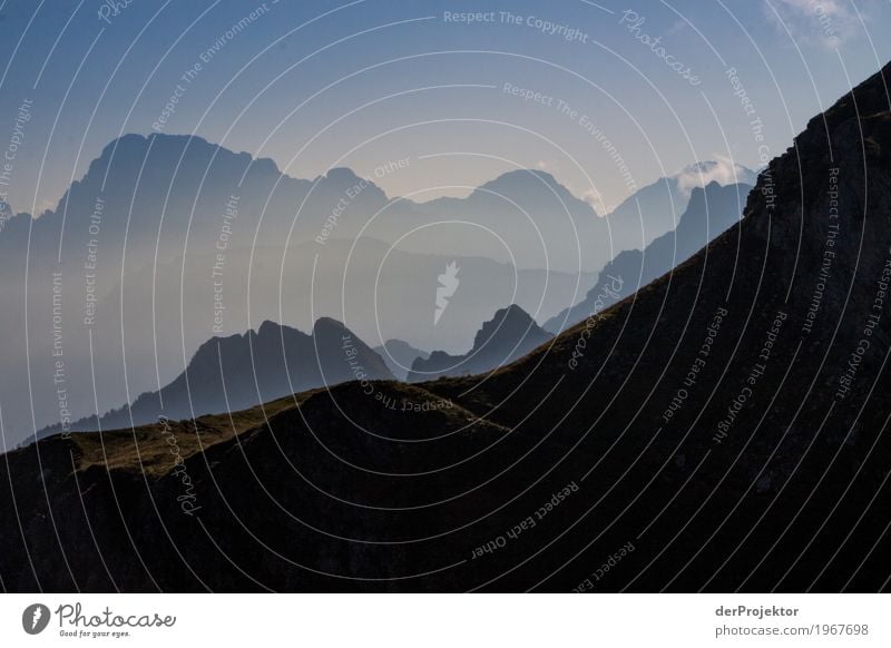 Backlit sunrise mountains in South Tyrol II Top of the mountain Mountaineering White Blue Freedom Clouds Cloud formation Hiking Deserted Nature Alps