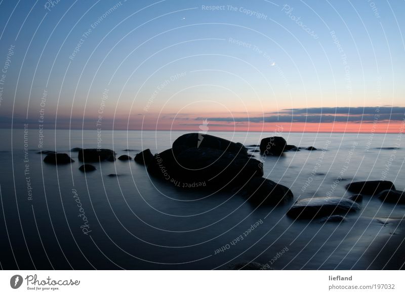 Baltic Sea in the evening Environment Nature Landscape Elements Water Sky Night sky Horizon Sunrise Sunset Coast Stone Moody Patient Calm Loneliness Relaxation