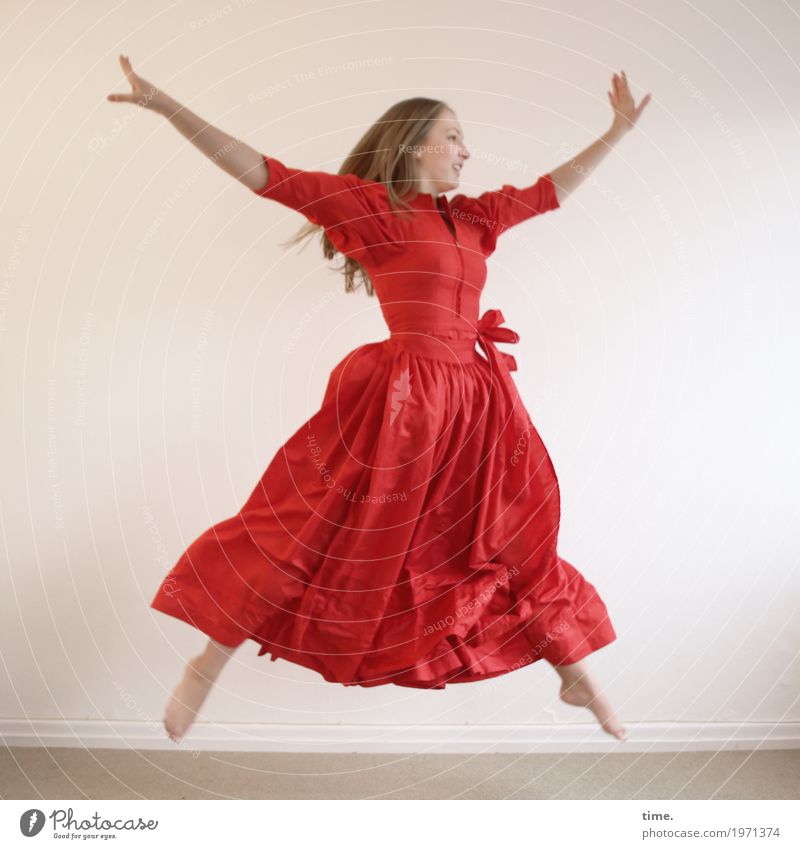. Room Feminine Young woman Youth (Young adults) 1 Human being Dress Blonde Long-haired Movement Jump Dance Athletic Happiness Beautiful Red Joy