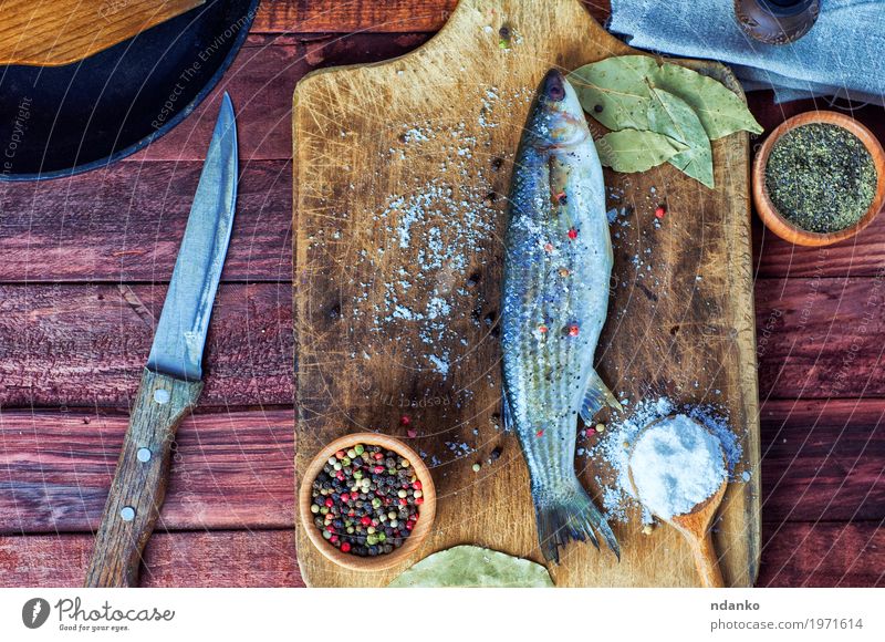 Fresh fish smelt for cooking Food Fish Herbs and spices Nutrition Eating Diet Knives Table Kitchen Nature Wood Metal Delicious Natural Above Brown Black pepper