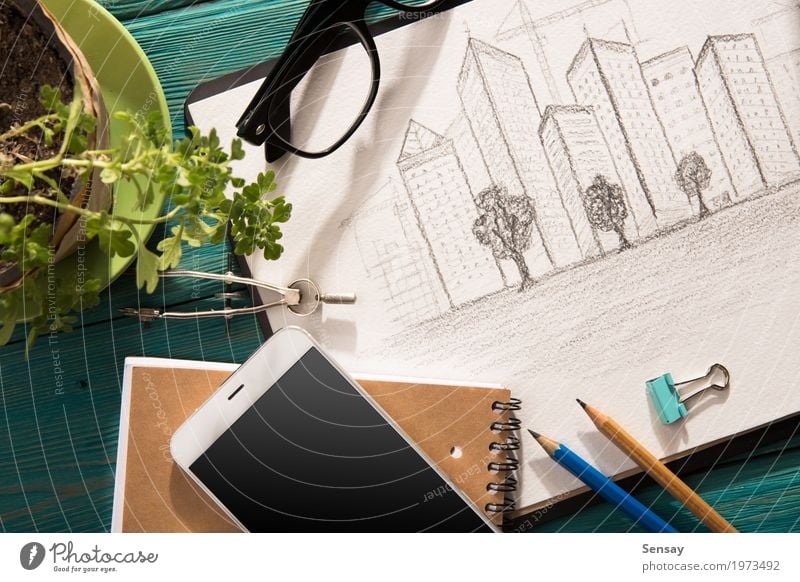Real estate concept - sketch of architecture on the desk Design House (Residential Structure) Desk Table Workplace Industry Business Telephone Technology Plant