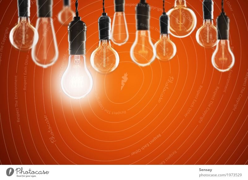 Idea and leadership concept - bulbs on the grunge background Design Lamp Success Science & Research Technology Old Bright Red Energy Creativity