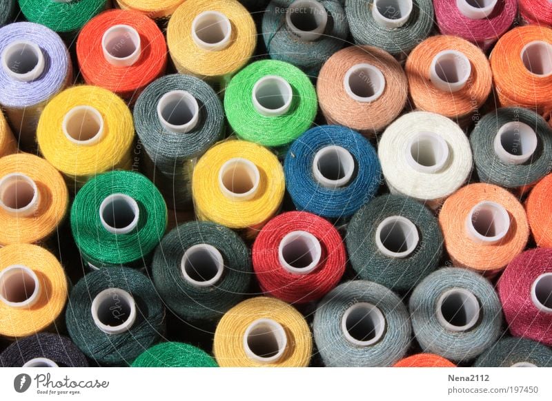 Heap of multi-coloured sewing pins on a white background, Stock image