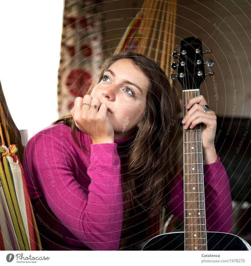 Vibration | guitar pages. Young woman holding guitar Room Feminine Youth (Young adults) 1 Human being Music Guitar Hammock Observe Touch Think Brown Orange Pink