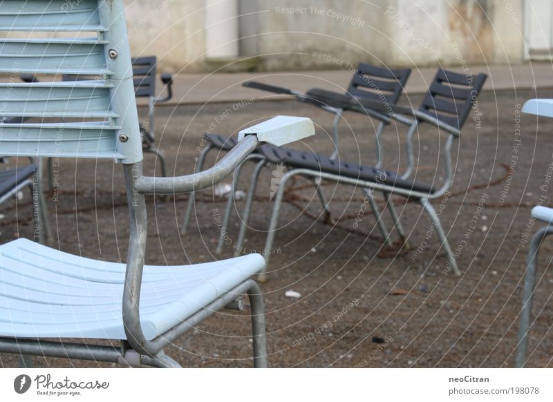 chairs Chair Asphalt Places Chain Metal Plastic Stand Blue Gray Esthetic Contentment Relaxation Symmetry Colour photo Exterior shot Deserted Day