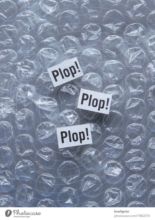 Plop! Plop! Plop! Bubble wrap Characters Signs and labeling Communicate Round Gray Black White Emotions Joy Relaxation Infancy Noise Colour photo Studio shot