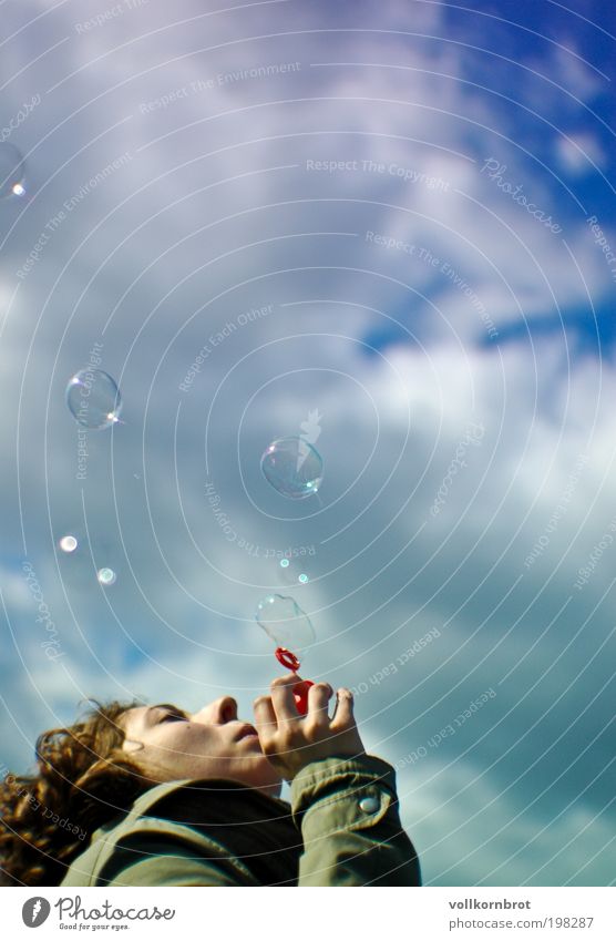 soap bubbles Joy Happy Human being Feminine Young woman Youth (Young adults) 1 18 - 30 years Adults Air Sky Clouds Beautiful weather Jacket Brunette Curl Dream