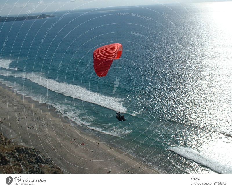 Paragliding on the cliff to the sea Paraglider Beach Cliff Ocean Sports Flying