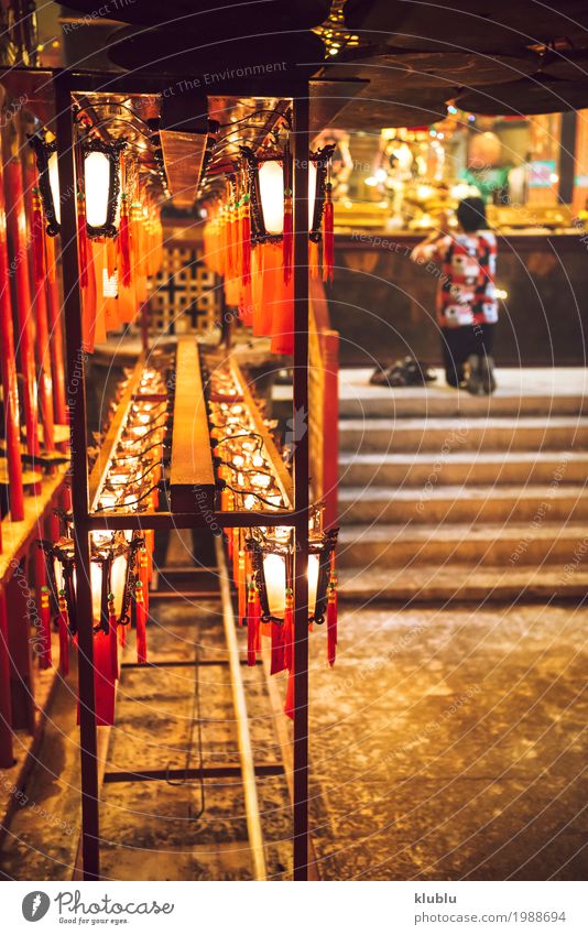 A person praying in temple Decoration Lamp Human being Culture Building Red Religion and faith Lantern light Temple Hongkong Asia Buddhism Church service asian