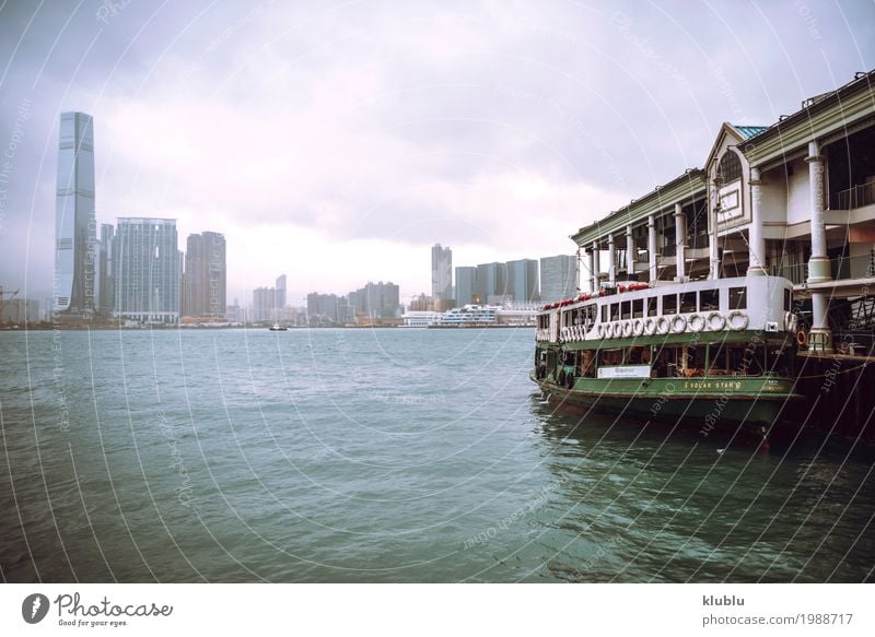 A boat station and cityscape in Hong Kong Life Vacation & Travel Tourism Trip Landscape Downtown High-rise Building Architecture Ferry Watercraft Sail Movement