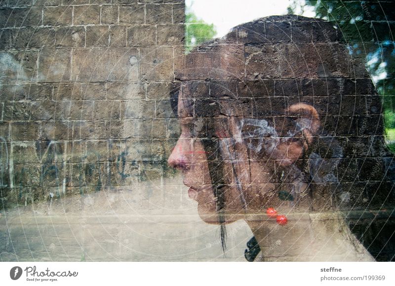 ambiguity Feminine Young woman Youth (Young adults) Head 1 Human being 18 - 30 years Adults Beautiful Meditative Earring Double exposure Wall (barrier) Unclear