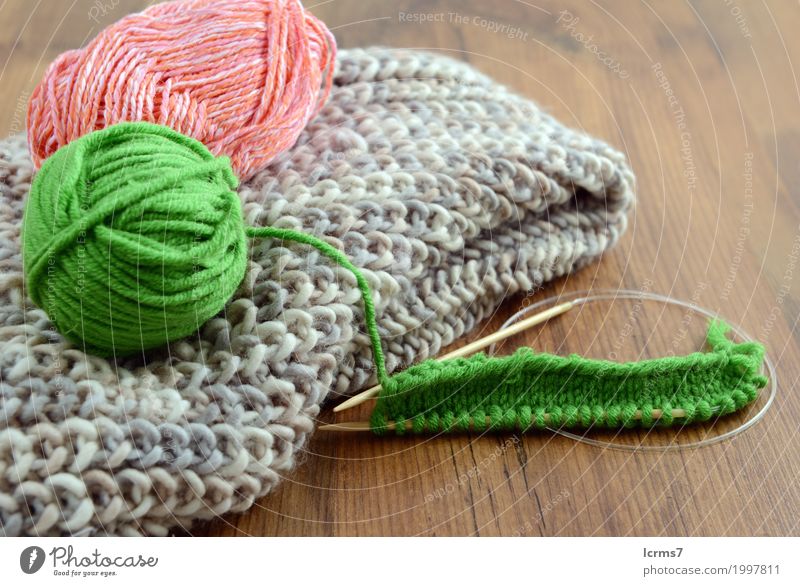 knit needles and wool on table. knitting. - a Royalty Free Stock