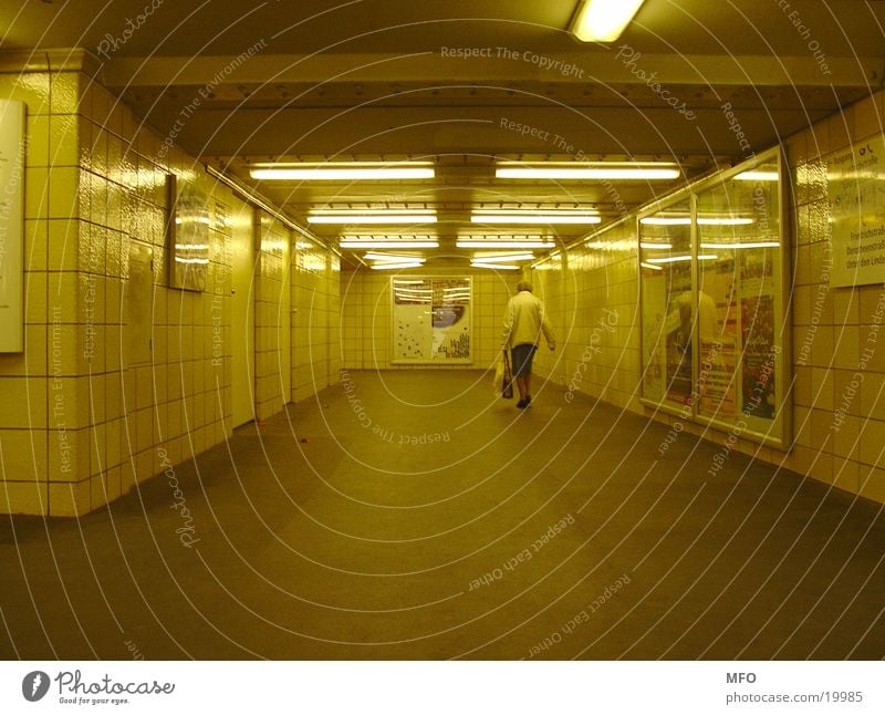 Pensioner in the Berlin underground tunnel Senior citizen Underground Tunnel London Underground Architecture Female senior Light artificial world