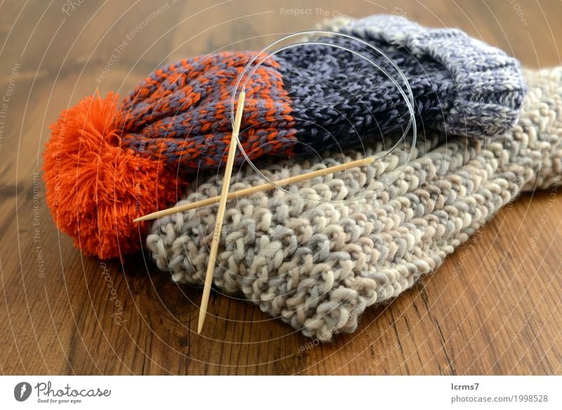 knitting scarf and woolly has Leisure and hobbies Warmth Fashion Wool Knit Cap Creativity creased yarn handmade needle The Needles Background picture woolen