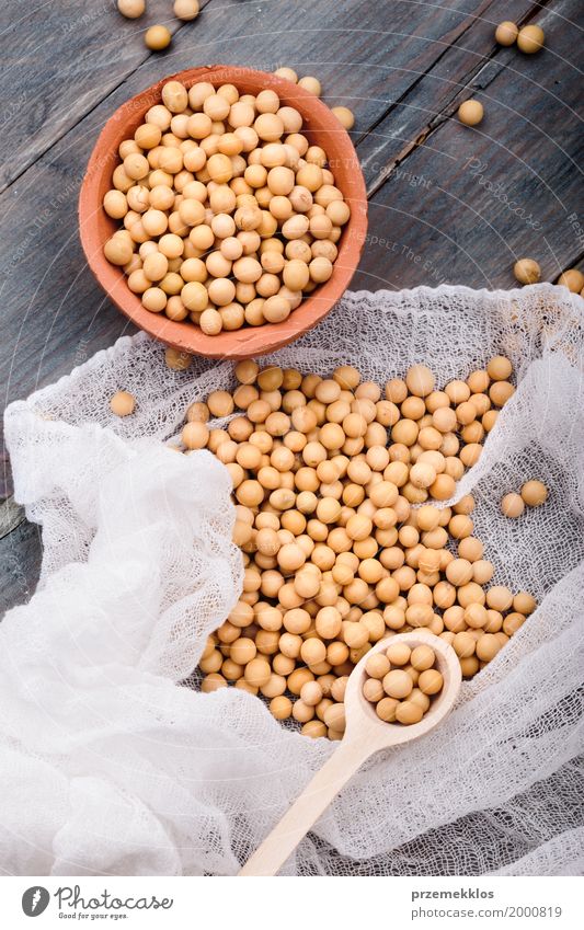 Soy beans in a bowl on wooden table Food Grain Nutrition Organic produce Vegetarian diet Asian Food Bowl Nature Wood Fresh Natural Beans Fiber healthy