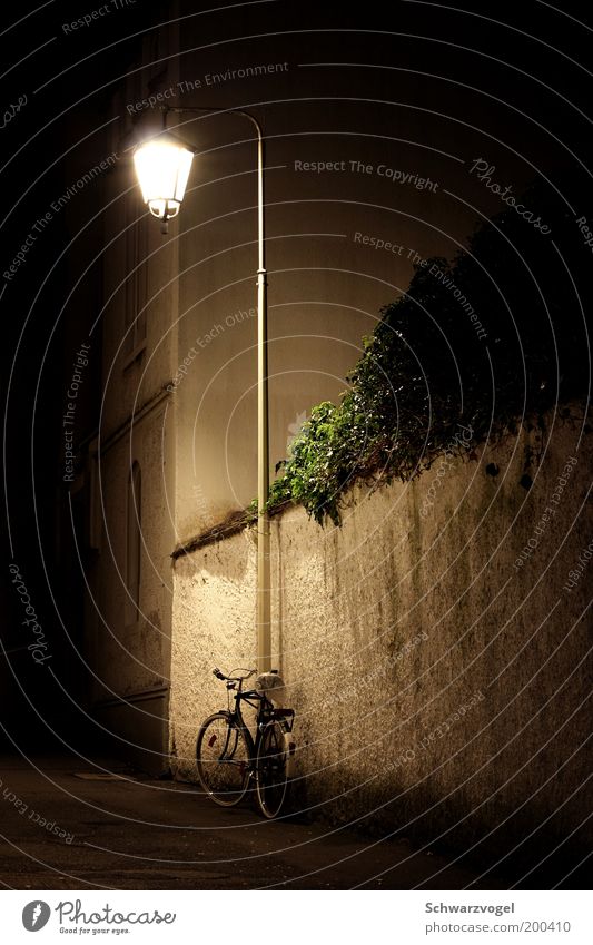 It dreams - of the Tour de France Bicycle Old town Deserted Illuminate Stand Authentic Moody Safety (feeling of) Loneliness Calm Stagnating Lantern Alley Lamp