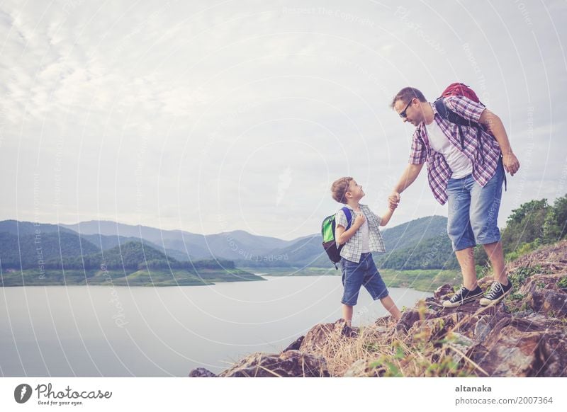 Father and son standing near the lake at the day time. Lifestyle Joy Happy Leisure and hobbies Vacation & Travel Trip Adventure Freedom Summer Mountain Hiking