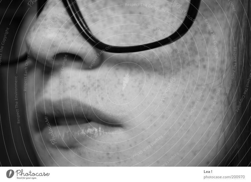 spectacle wearers Feminine Face Freckles 1 Human being Eyeglasses Think Calm Education Person wearing glasses Lips Nose Mouth Black & white photo Interior shot