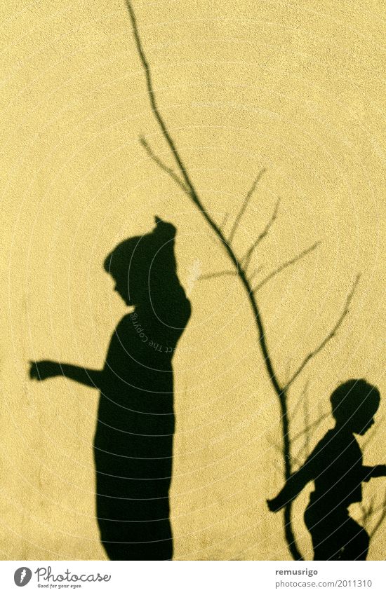 Shadows of children Playing Child Boy (child) Family & Relations Friendship Infancy Together Black background kids Scene two wall Colour photo Exterior shot