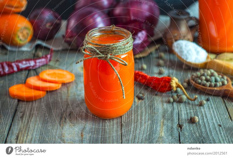 Juice from carrots, onions and spices in a glass jar Vegetable Fruit Herbs and spices Vegetarian diet Beverage Cold drink Glass Spoon Table Diet Old Eating