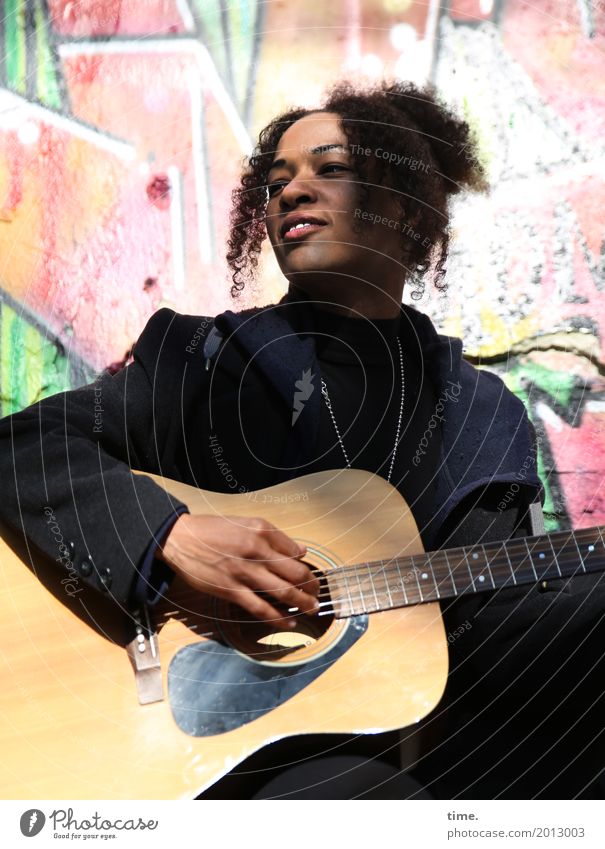 Music | Ghetto Sounds (III) Feminine Woman Adults 1 Human being Singer Musician Guitar Coat Jewellery Hair and hairstyles Brunette Curl Afro Graffiti Observe