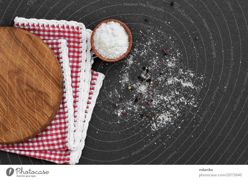 White salt in a wooden bowl on a black surface Herbs and spices Nutrition Vegetarian diet Kitchen Wood Crystal Eating Natural Red Black grain Vantage point