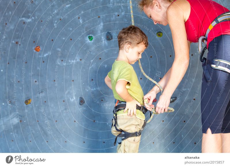 little girl climbing a rock wall Joy Leisure and hobbies Playing Vacation & Travel Adventure Entertainment Sports Climbing Mountaineering Child Rope Human being