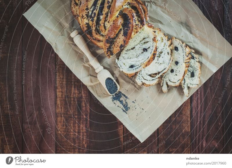 Baked pastry with poppy seeds Food Roll Dessert Herbs and spices Nutrition Spoon Wood Eating Fresh Natural Brown Black rolls pastries Heap sweet Organic healthy