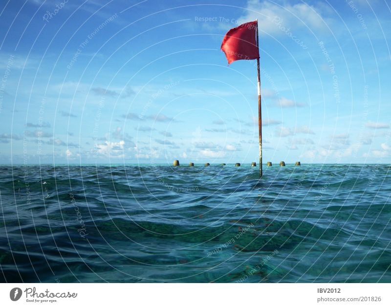 Red flag in paradise Vacation & Travel Tourism Trip Far-off places Freedom Summer Summer vacation Ocean Waves Maldives Environment Nature Water Sky Clouds