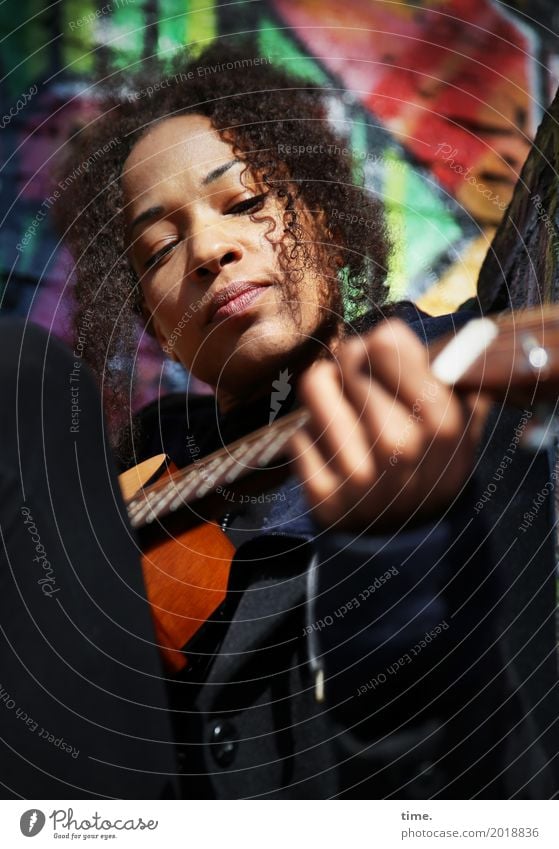Music | Ghetto Sounds (II) Feminine Woman Adults 1 Human being Artist Musician Guitar Coat Hair and hairstyles Brunette Long-haired Curl Afro Graffiti Observe