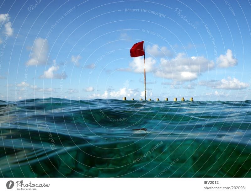 Red flag in paradise II Leisure and hobbies Vacation & Travel Tourism Trip Far-off places Freedom Ocean Aquatics Nature Landscape Water Sky Clouds Sun Sunlight