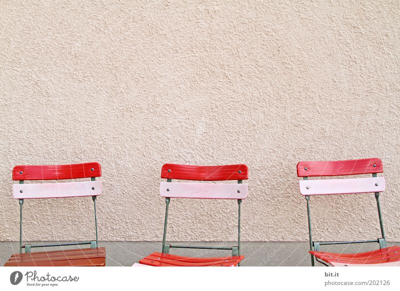 The three from the Leberwurstbeiz Calm Chair Facade Stone Concrete wood Pink Red Seating Stand Garden chair Empty 3 Folding chair Wall (building) Row Free