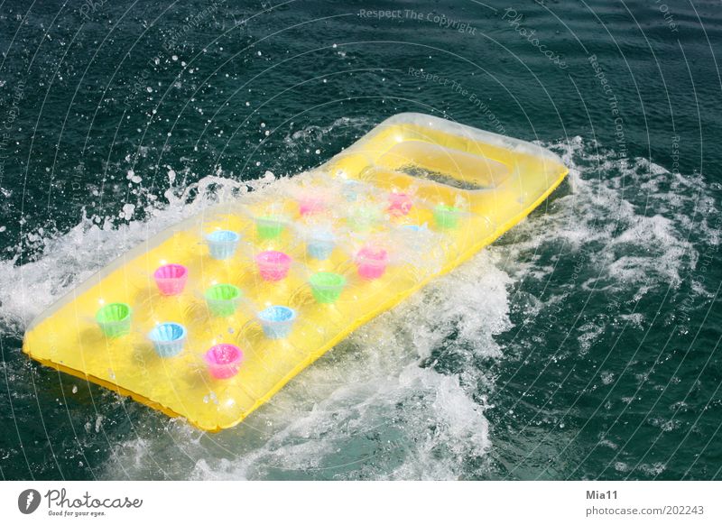 water fun Summer Summer vacation Ocean Waves Water Toys Swimming & Bathing Blue Multicoloured Yellow Green Pink Air mattress Inject Water wings Colour photo