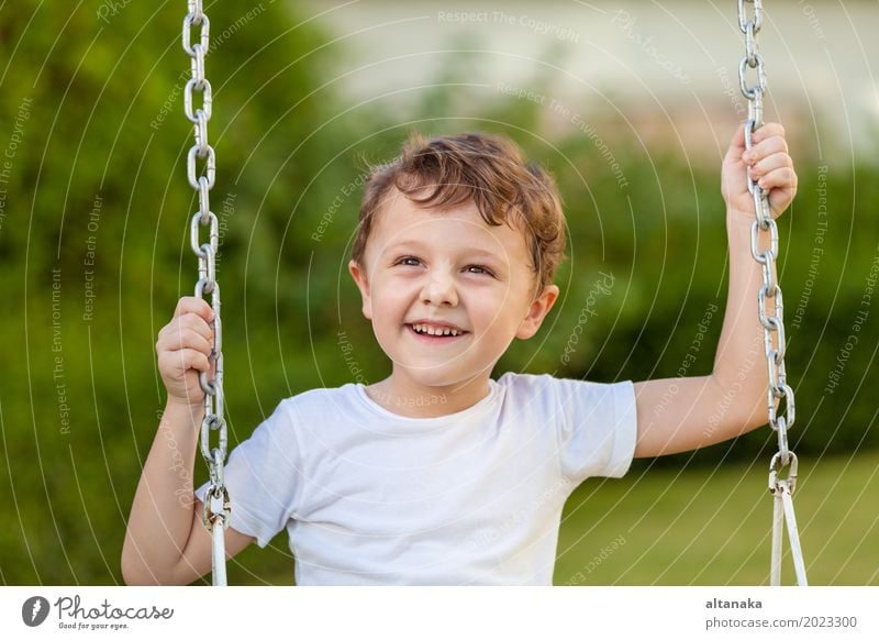 happy little boy playing on playing on the playground Lifestyle Joy Happy Face Relaxation Leisure and hobbies Playing Vacation & Travel Adventure Summer