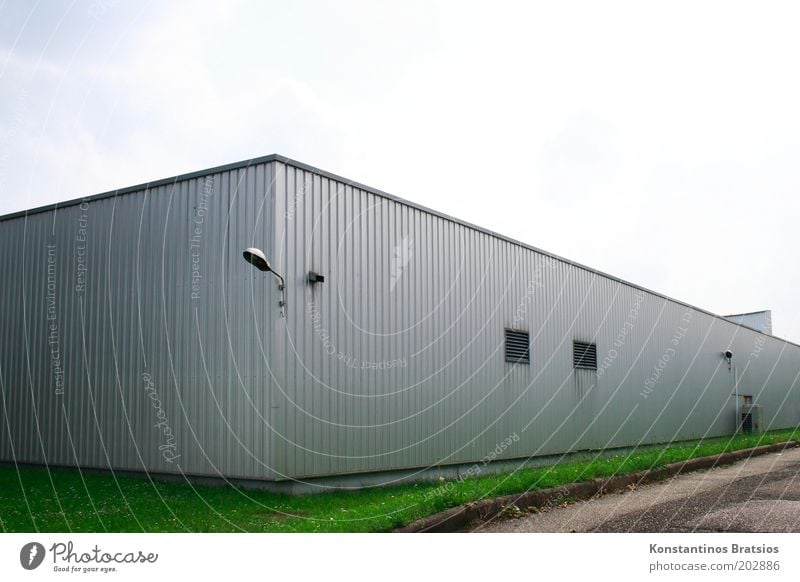 warehouse Sky Cloudless sky Grass Meadow Building Warehouse Hall Facade Window Exterior lighting Simple Gray Green Silver Cladding Metal Stock of merchandise