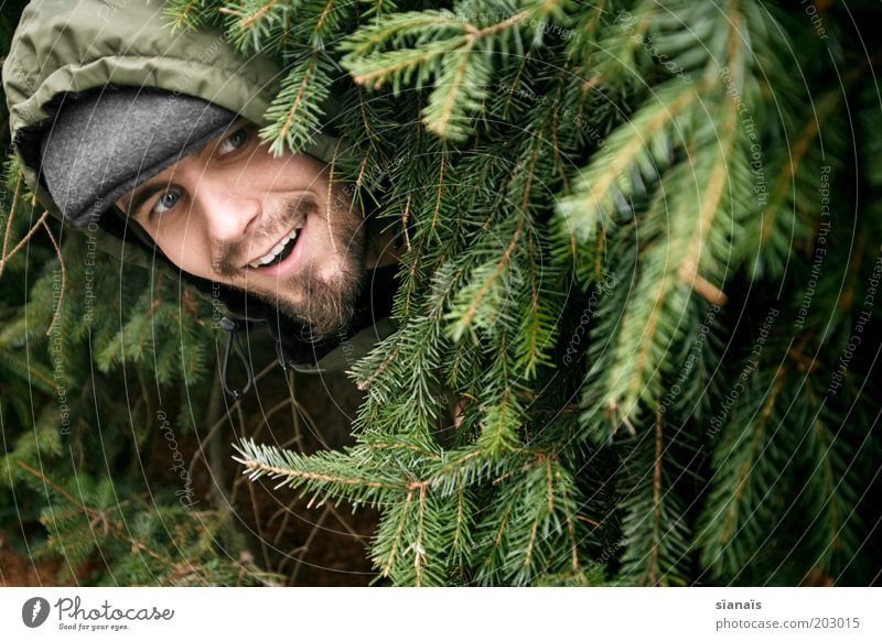 have a luncheon Masculine Man Adults Life Head Fir tree Discover Joy Hide Hiding place Provoke Stupid Daft Green Camouflage Camouflage colour Hooded (clothing)