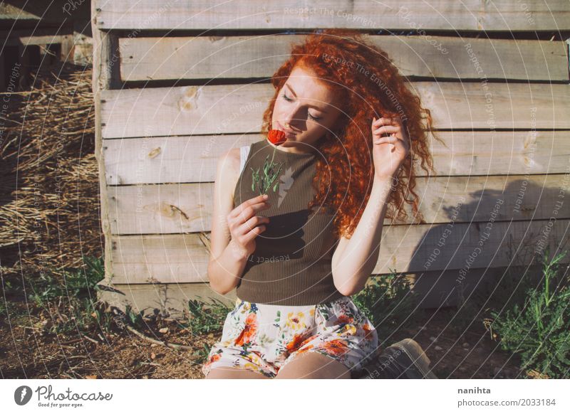 Redhead young woman smelling a flower Lifestyle Joy Healthy Wellness Well-being Relaxation Calm Fragrance Freedom Summer Summer vacation Feminine Young woman