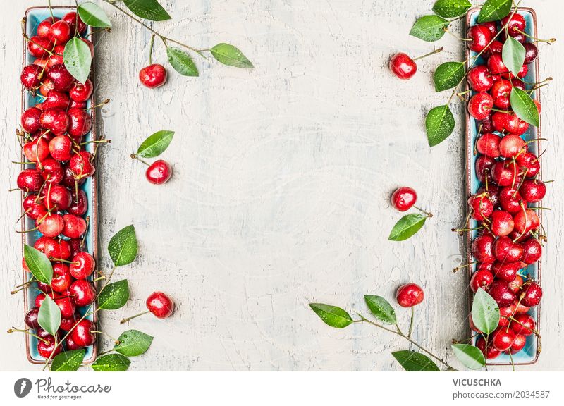 Background with red cherries and green leaves Food Fruit Nutrition Organic produce Vegetarian diet Diet Style Design Healthy Healthy Eating Life Summer Garden