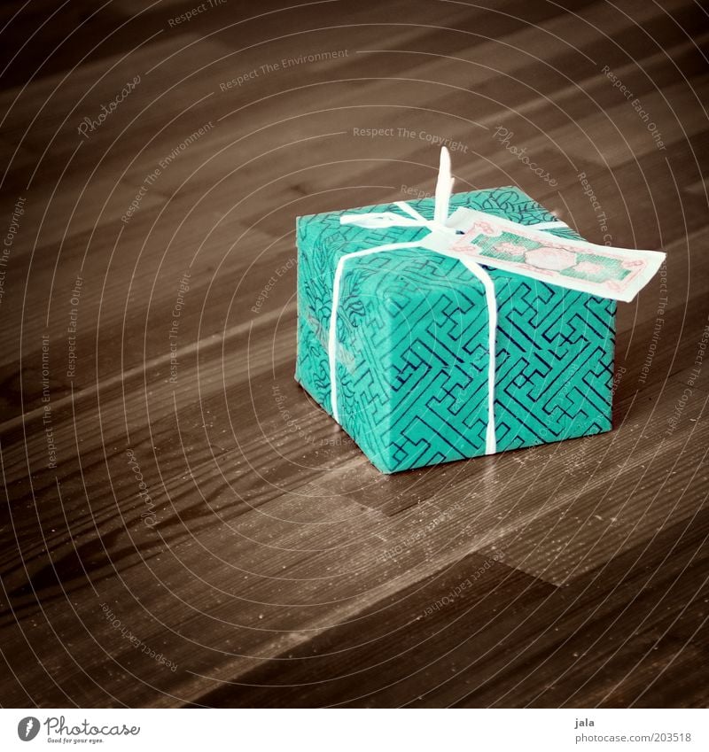 happy birthday, speedy Birthday Gift wrapping Parquet floor Beautiful Brown Green Joy Surprise Anticipation Packaged Colour photo Interior shot Deserted
